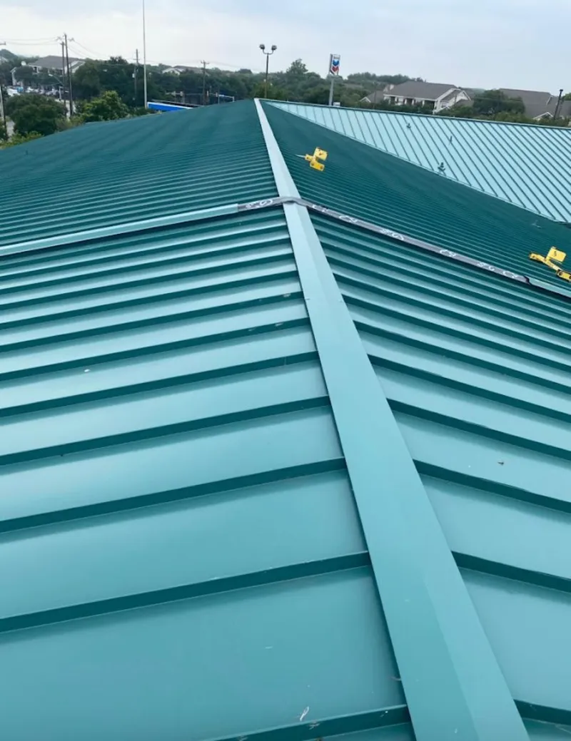 Green commercial metal roof ridge and valley for Metal Roof Repair in Melissa