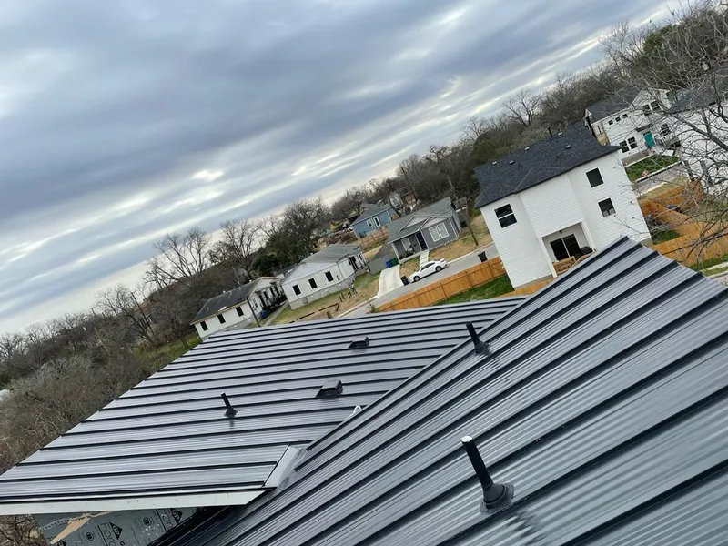 Standing seam metal roof panels with vents for Skylight Repair in Melissa